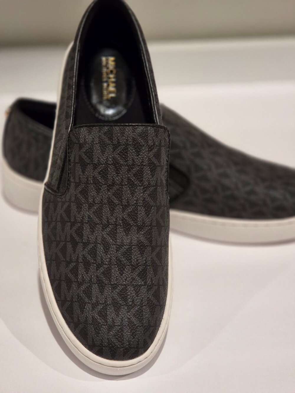 Michael Kors Women's black leather slip on shoes, size 8.5